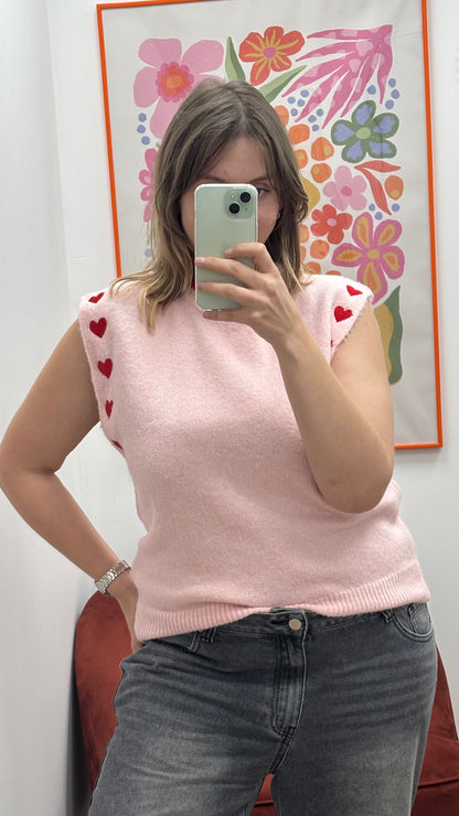 pull sans manche rose pale motif cœur aux épaules