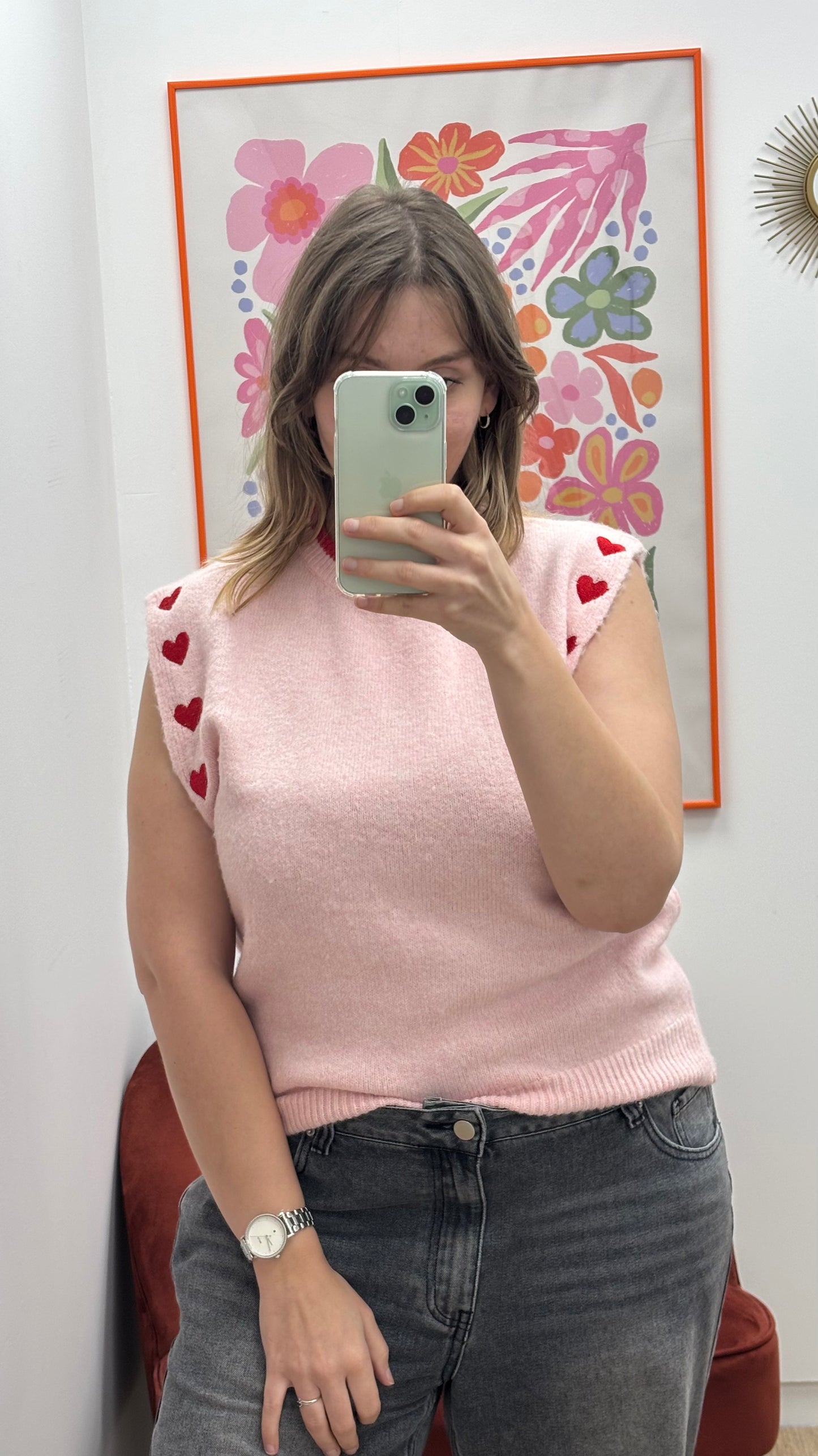 pull sans manche rose pale motif cœur aux épaules